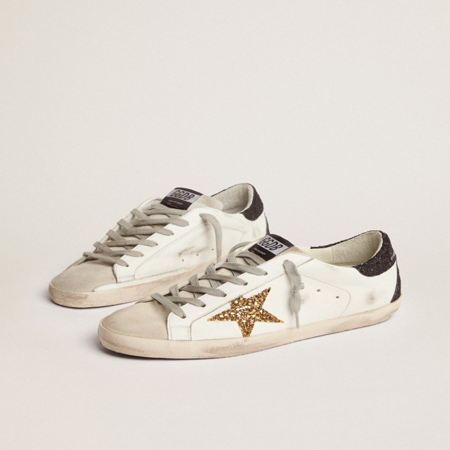 SIZE 8 SUPERSTAR SNEAKERS WITH GOLD STAR AND GLITTERY BLACK HEEL TAB